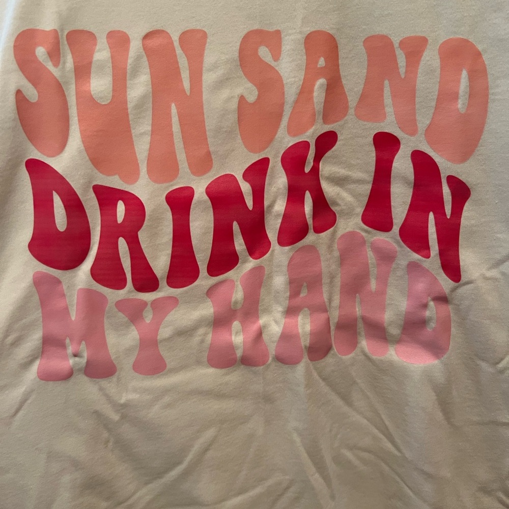 Cream; never used T-shirt “Sun, sand, drink in my hand”